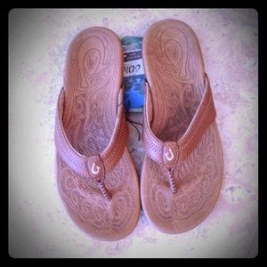 OluKai flip flops